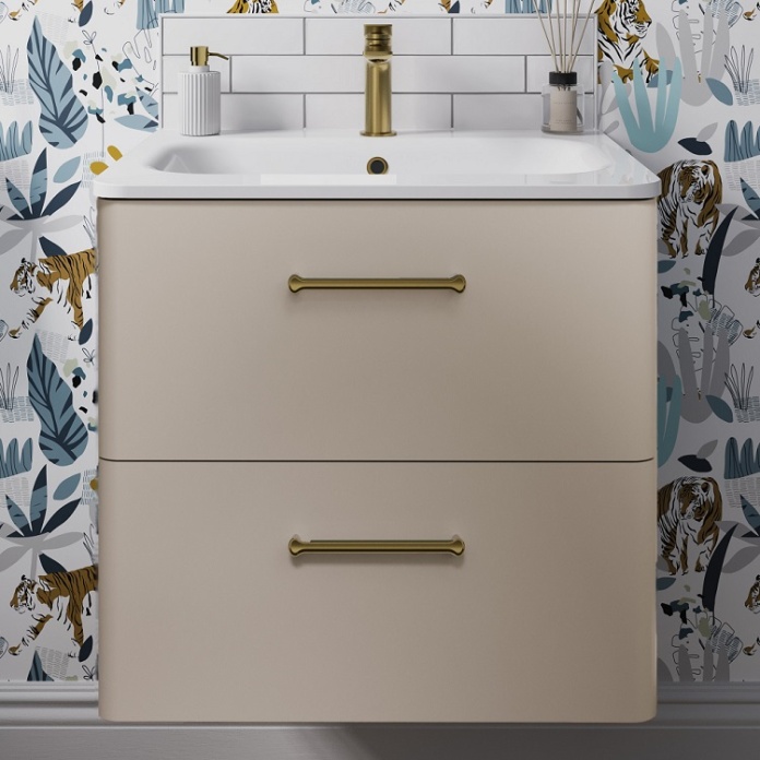 Product lifestyle image of Britton Bathrooms Camberwell Warm Beige Wall Hung Vanity Unit with Basin in Bathroom with brass handles close up
