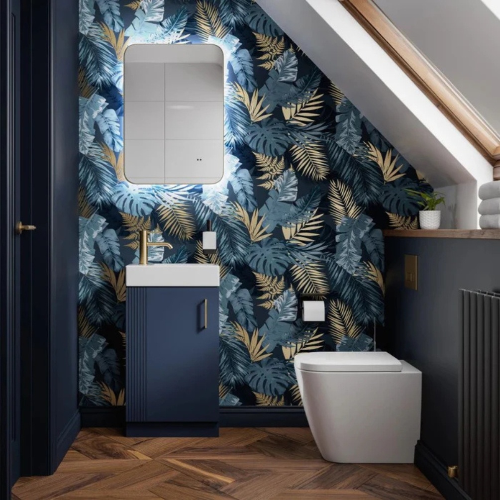 Lifestyle image of the hib. Arcane Curve 500mm x 700mm Brushed Brass Illuminated Frame Mirror