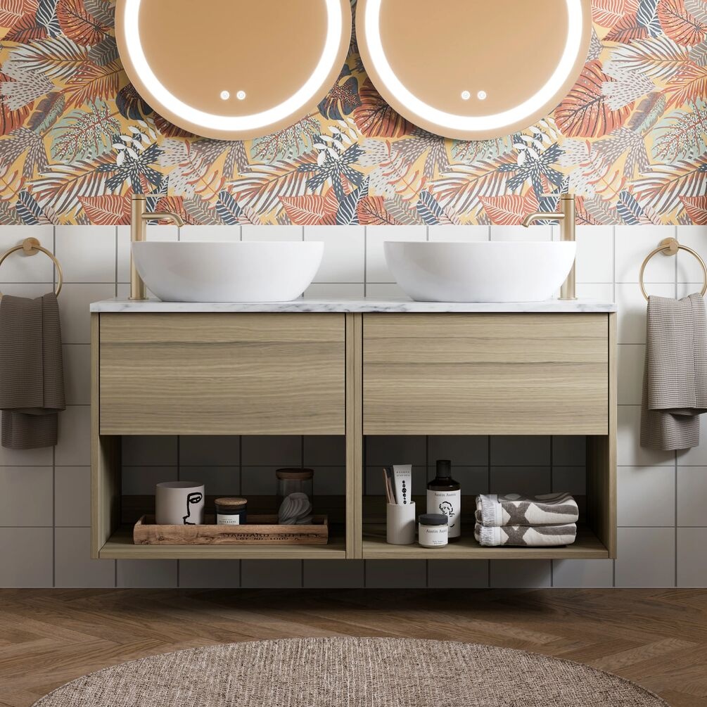 Lifestyle image of the Britton Hackney Cherry Wood 1000mm Double Wall Hung Vanity Unit & Worktop mounted on a bathroom wall with two countertop basins and two round mirrors