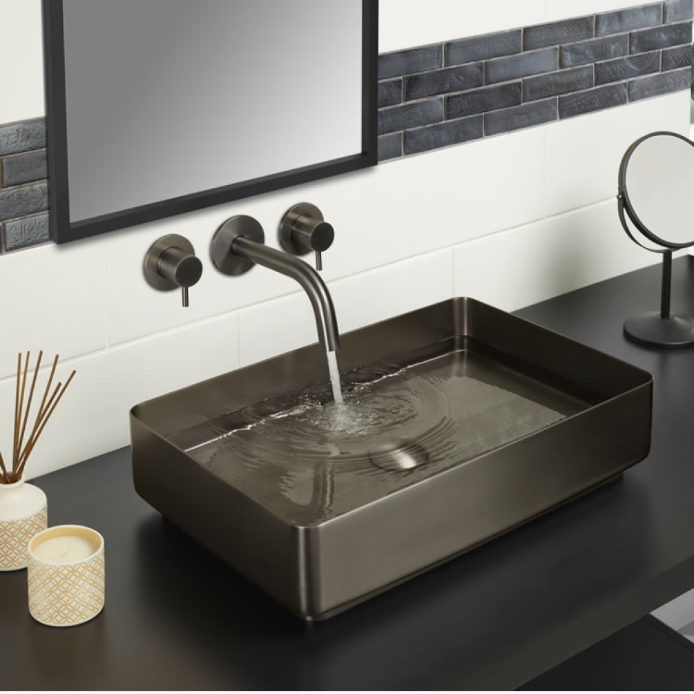 Product Lifestyle image of the JTP Vos Brushed Black Stainless Steel Countertop Basin paired with a wall mounted basin mixer