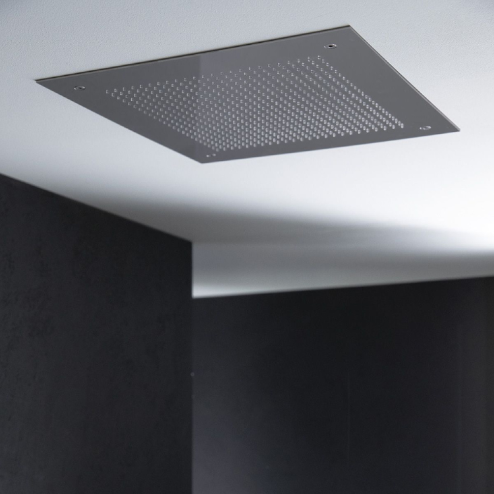 Product Lifestyle image of the Crosswater Tranquil 380 Polished Stainless Steel Recessed Shower Head from a low angle