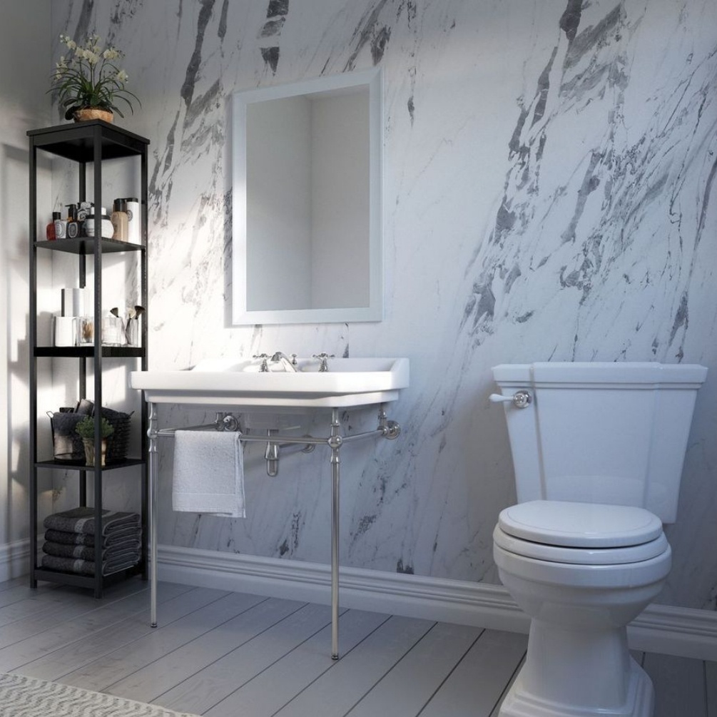 Lifestyle image of the Showerwall Laminate Lightning Marble 2440mm x 1200mm Square Cut Hydrocore Wall Panel - SW51 with traditional basin and close coupled toilet