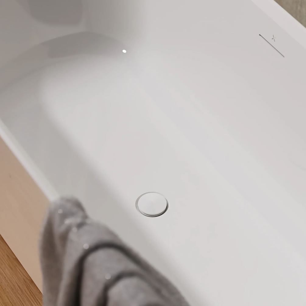 Lifestyle image of Crosswater Gloss White Unslotted ClearStone Click-Clack Bath Waste