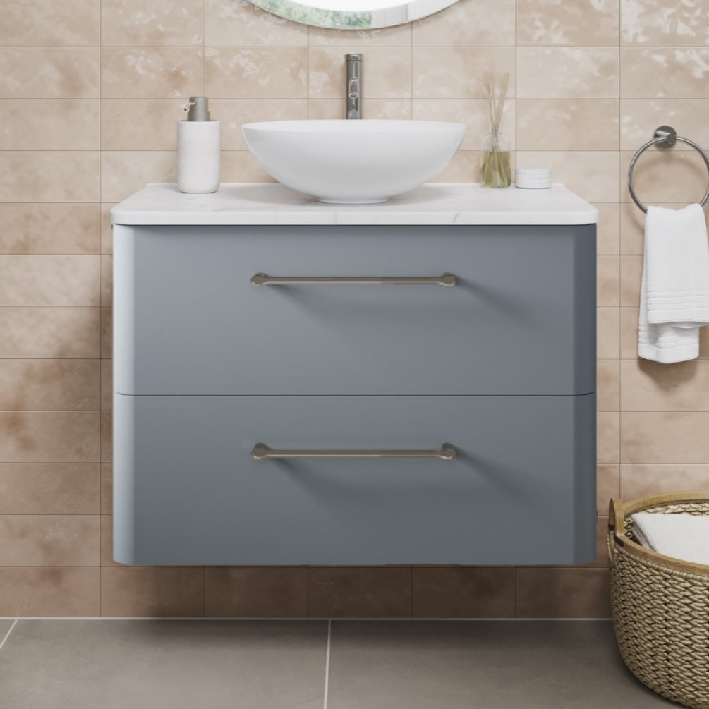 Product Lifestyle image photo of Britton Bathrooms Camberwell Dusty Blue Wall Hung Vanity Unit with Worktop in light brick tiled bathroom close up