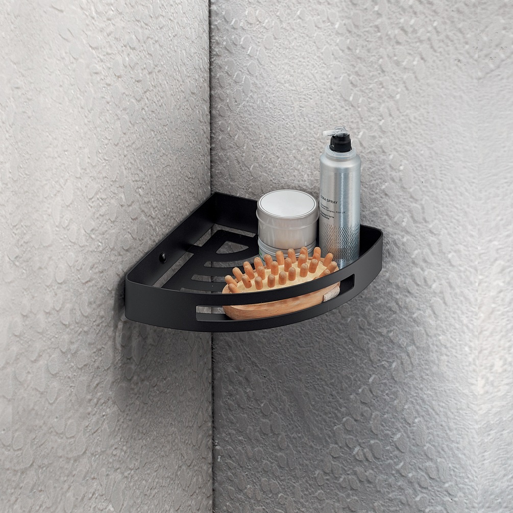 product lifestyle image of origins living nerva matt black corner shower basket