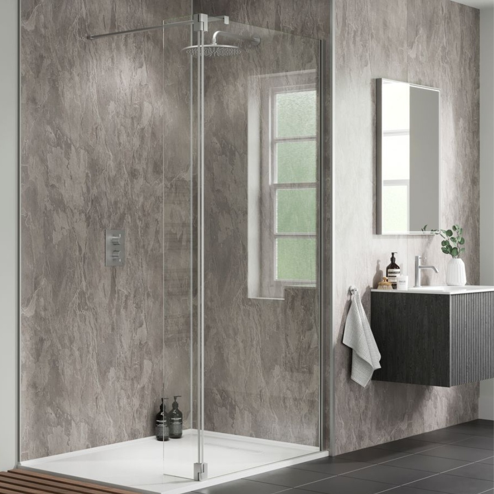 Lifestyle image of the Showerwall Laminate Moonstone 2440mm x 579mm Proclick Ply Wall Panel - SW69 installed in a corner shower enclosure