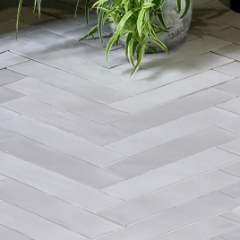 image of herringbone pattern bathroom floor tiles - ca pietra lido porcelain matt floor tiles laid in herrigbone parquet style