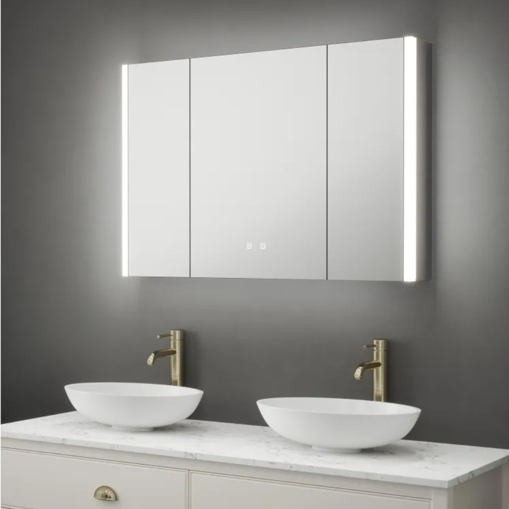 Product Lifestyle image of the Zurich Triple Door LED Mirror Cabinet mounted above a double vanity unit with countertop basins