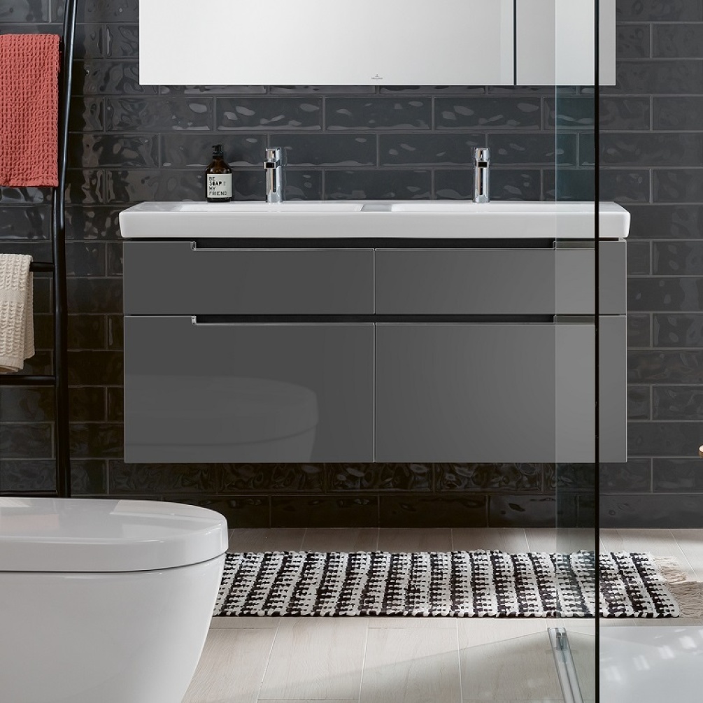 Lifestyle image of Villeroy and Boch Glossy Grey 1287mm Wall Hung Vanity Unit and Double Basin hanging on grey brick tiled wall A91710FP