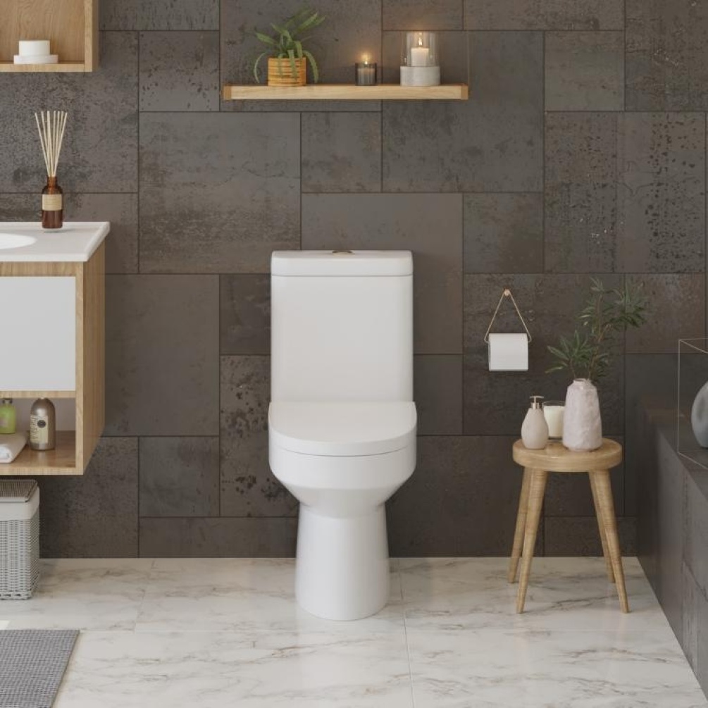 CGI Product Lifestyle Image of Globe Close Coupled Toilet and Soft Close Seat GLOBESHCC - front angle fully tiled view