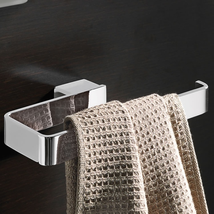 Lifestyle image of Origins Living Gedy Lounge Towel Ring with brown towel.