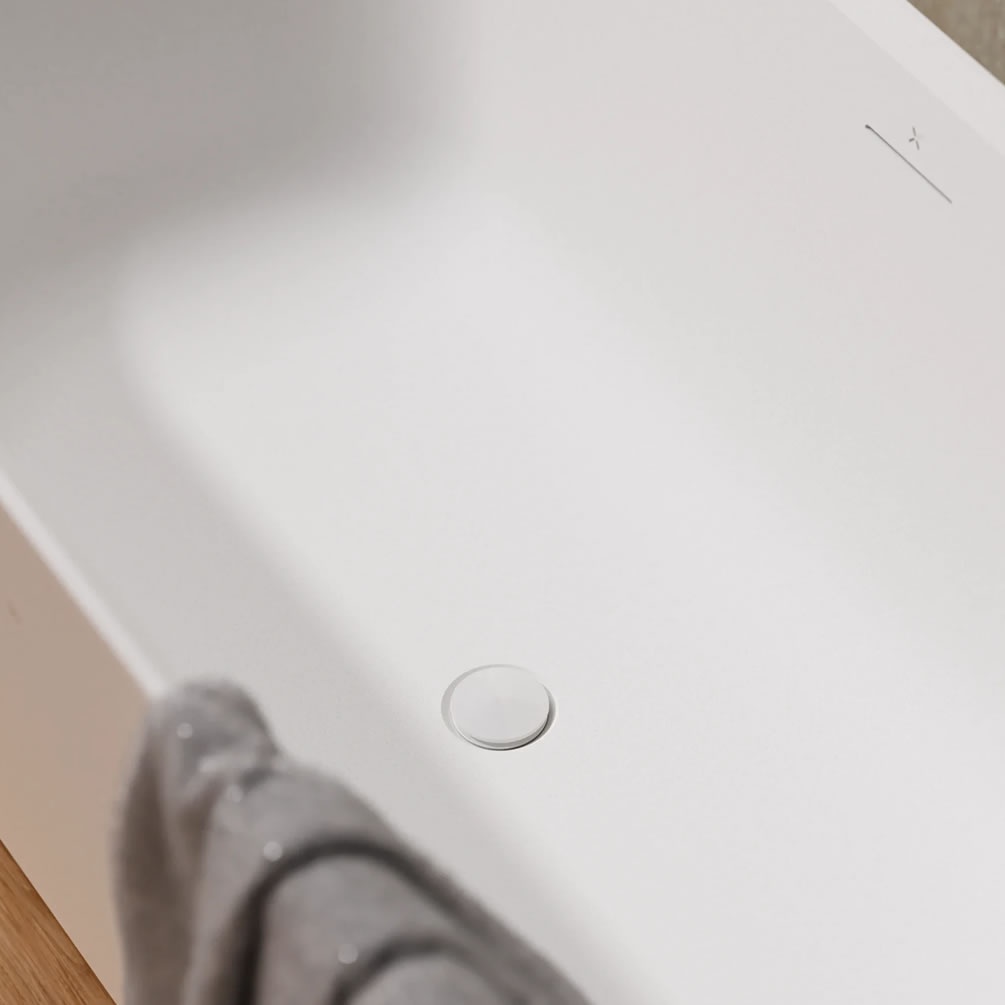 Lifestyle image of Crosswater Matt White Unslotted Clearstone Click-Clack Bath Waste