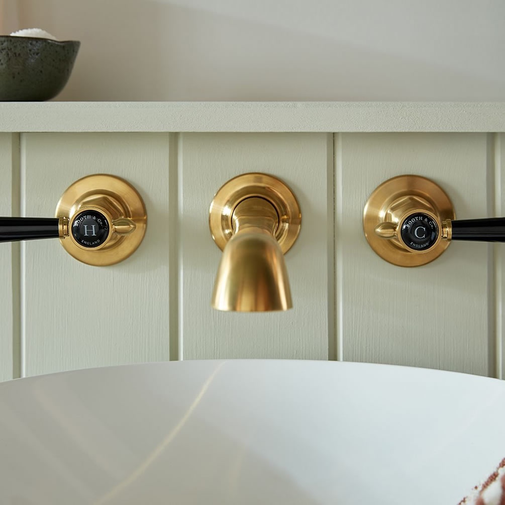 Booth & Co. Axbridge Black Lever Brushed Brass Wall Mounted Basin Mixer - Lifestyle Image 1