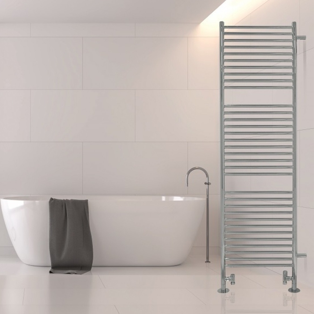 Lifestyle image of the The Sussex Range by JIS Midhurst 1765mm x 500mm Polished Stainless Steel Side Mounted Heated Towel Rail installed beside a freestanding bathtub