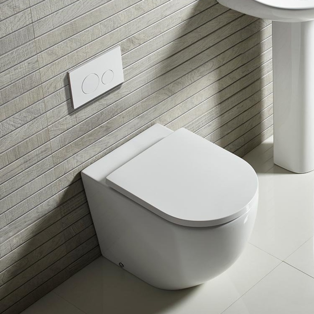 Lifestyle image of the Tavistock Orbit Rimless Back to Wall Toilet