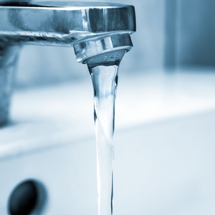 image of running tap to show hard vs soft water
