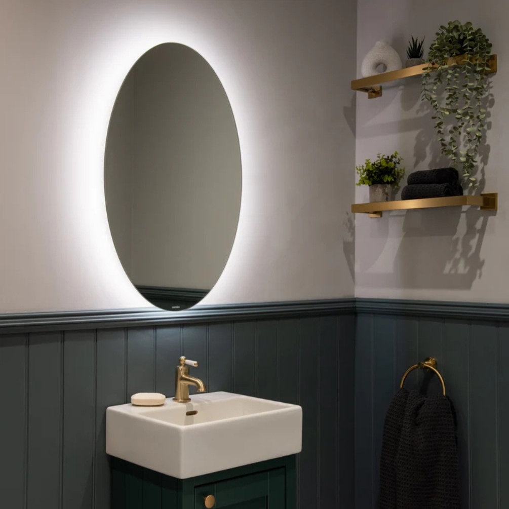 Lifestyle image of the Sensio Lustro Oval 800mm x 500mm Rechargeable Backlit LED Mirror