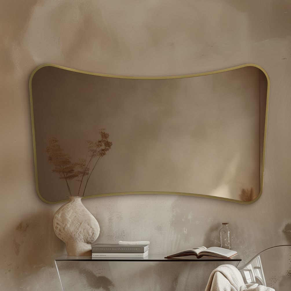 Product Lifestyle Photo of Origin Living Delphine Curve 1200mm x 700mm Mirror Brushed Brass in a room setting