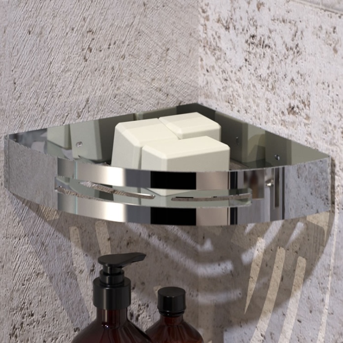 Lifestyle image of Origins Living Gedy Nerva Corner Shower Basket chrome mounted on textured cream wall.