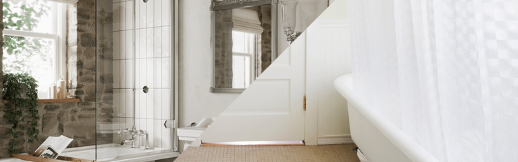 Two images of the Burlington Hampton Freestanding Shower Bath and a freestanding bath surrounded by a shower curtain intersected by a diagonal line