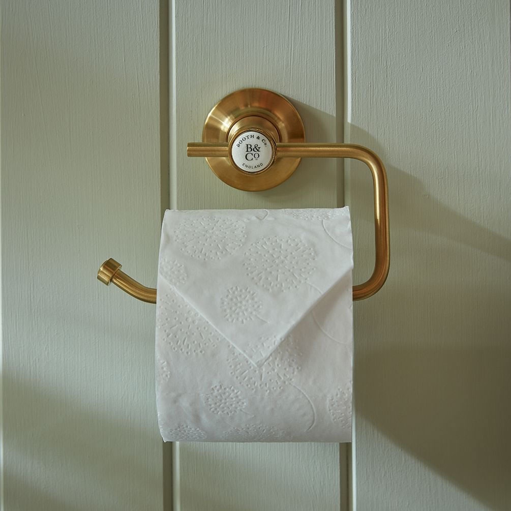 Booth & Co. Axbridge Brushed Brass/White Toilet Paper Holder - Lifestyle Image 1