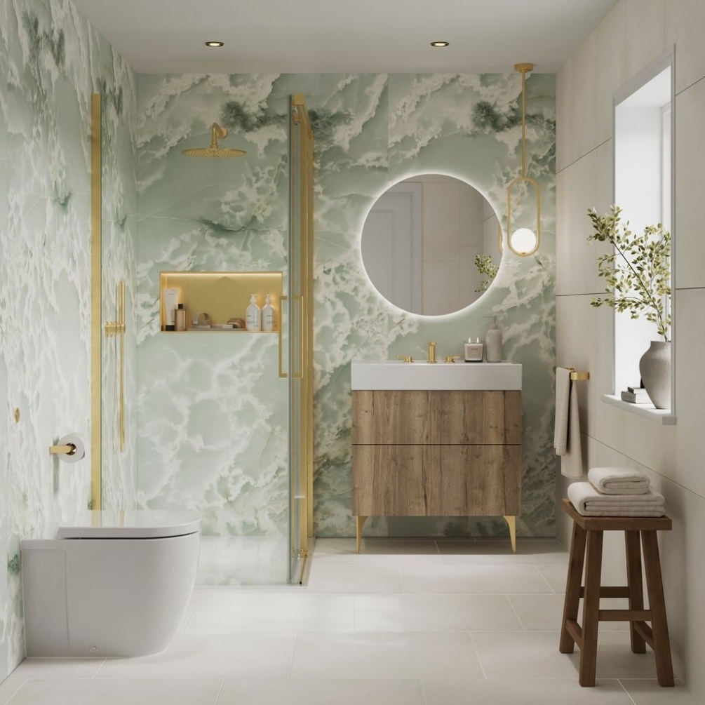 Lifestyle image of the Showerwall Laminate Onyx Mist 2440mm x 579mm Proclick Hydrocore Wall Panel - SW96 installed in the corner of a bathroom, behind a shower cubicle, back to wall toilet, and vanity unit with basin