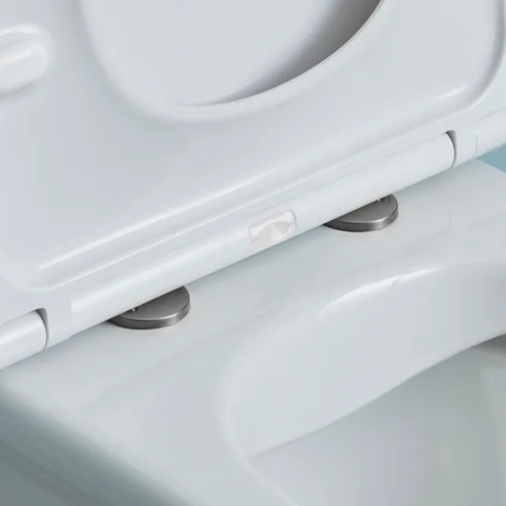 Lifestyle image of the Tavistock Gunmetal Wrap Over Toilet Seat Hinge Cover Caps