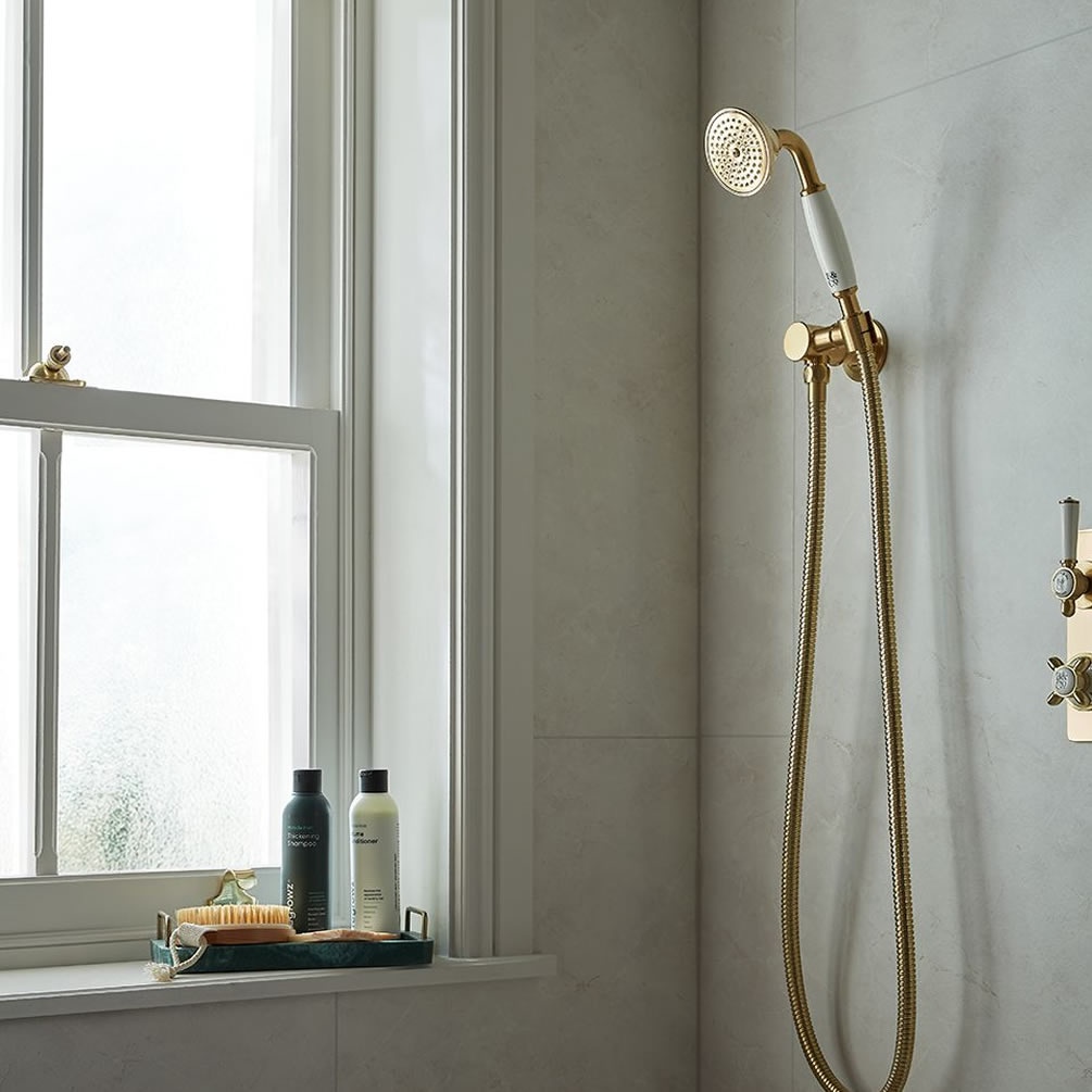 Booth & Co. Axbridge Brushed Brass/White Shower Handset, Hose & Wall Bracket - Lifestyle Image 1