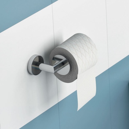 Lifestyle image of Origins Living Gedy G Pro Open Toilet Roll Holder chrome mounted on blue and white tiles.
