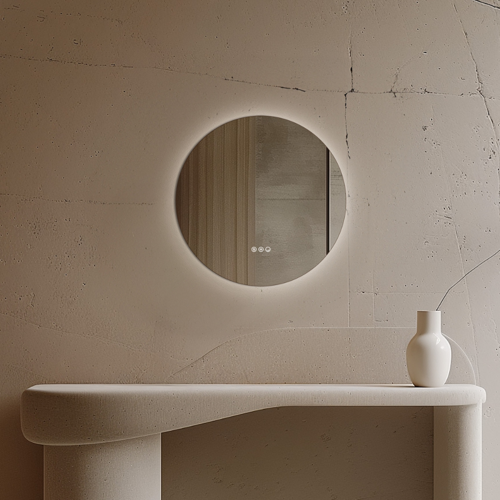 Product Lifestyle Image of the Origins Living 600mm x 600mm Claris Round Bathroom Mirror, hanging on a wall in front of a table.