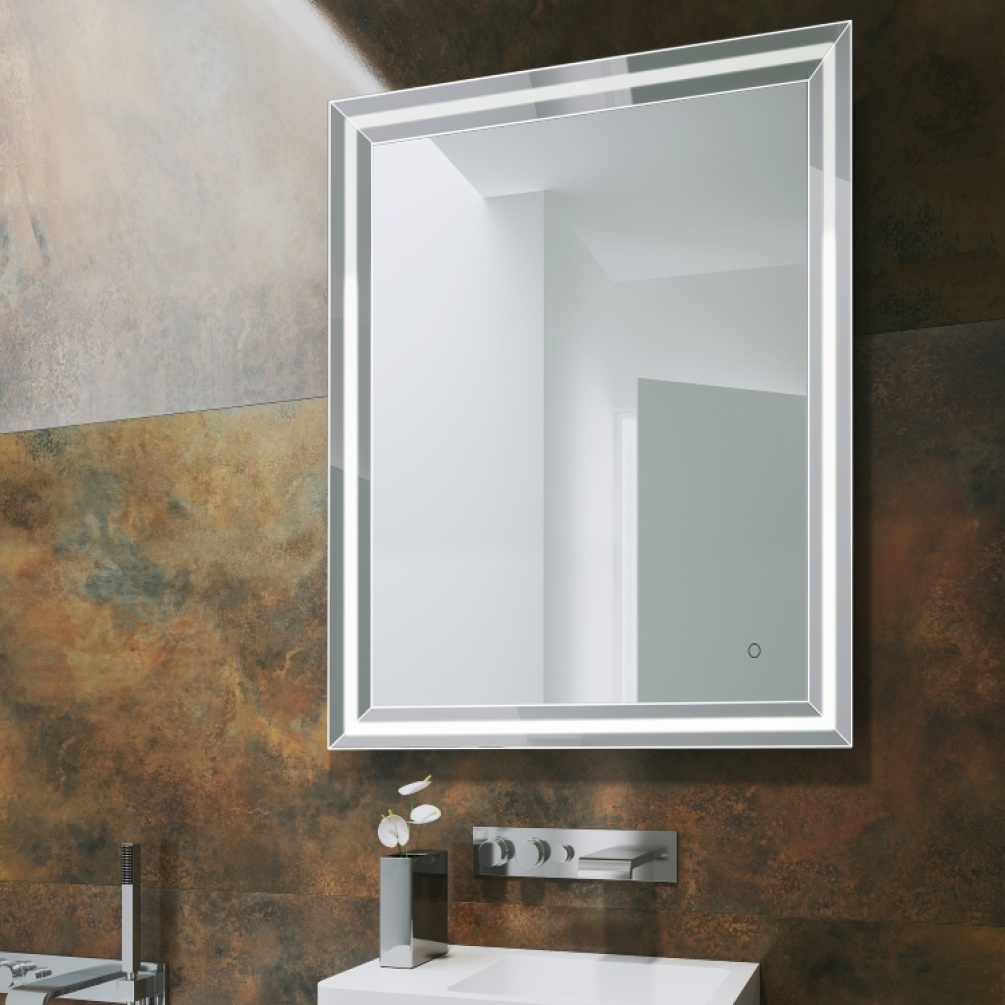 Image of Origins Living Ravenna Light Mirror against a dark patterned wall in a bathroom with basin and tap