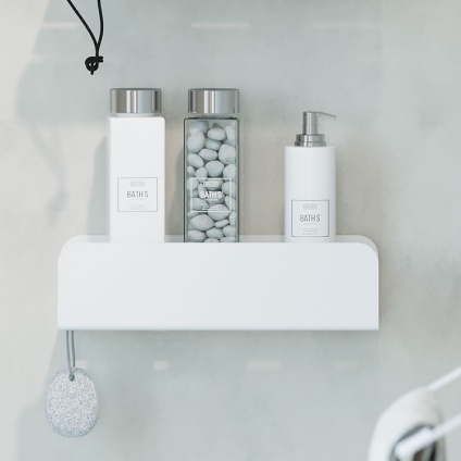 Lifestyle image of Origins Living Sonia Quick Deep Shower Shelf White mounted on marble white wall and filled with bottles.