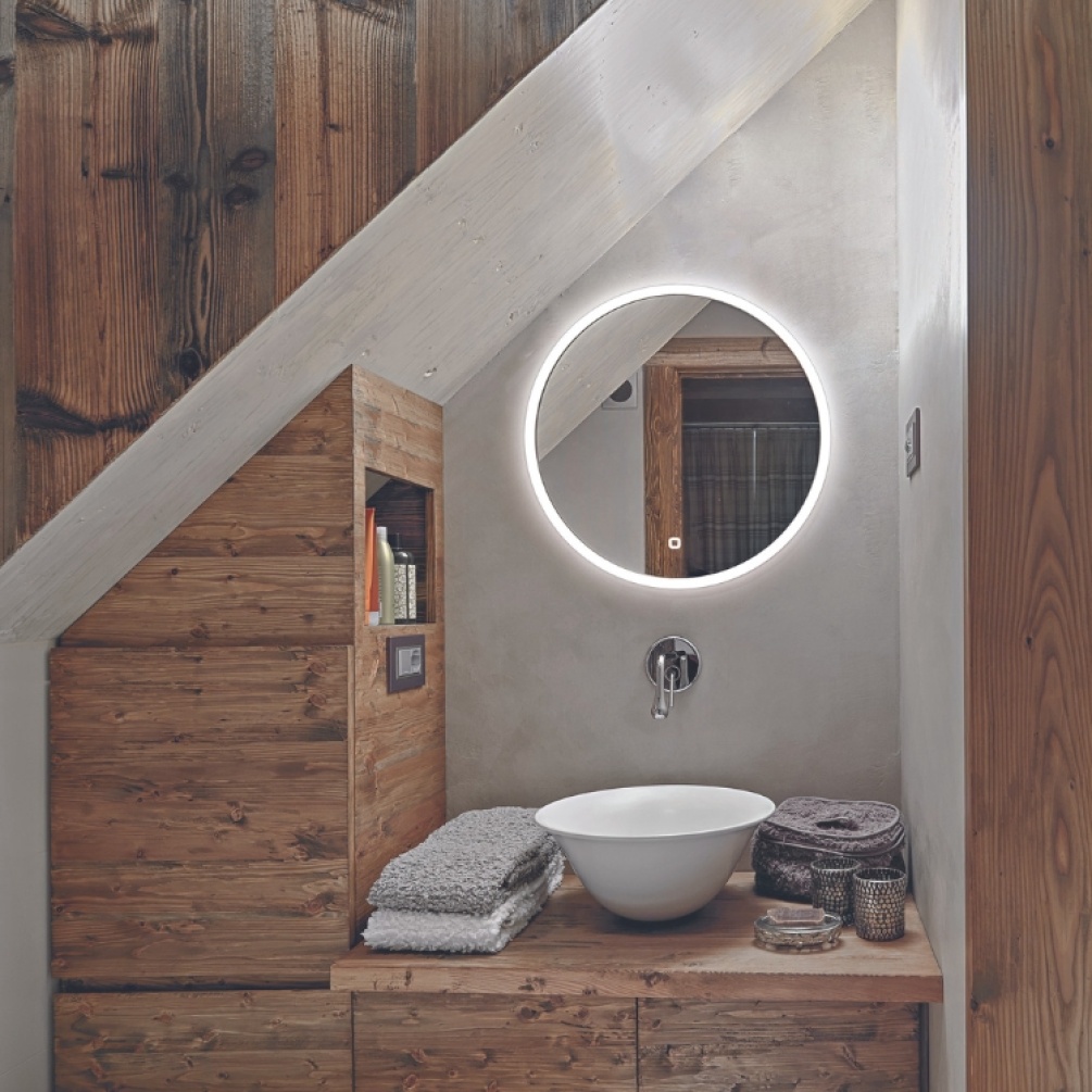 Product Lifestyle image of the HIB Sphere 600mm Round LED Bathroom Mirror