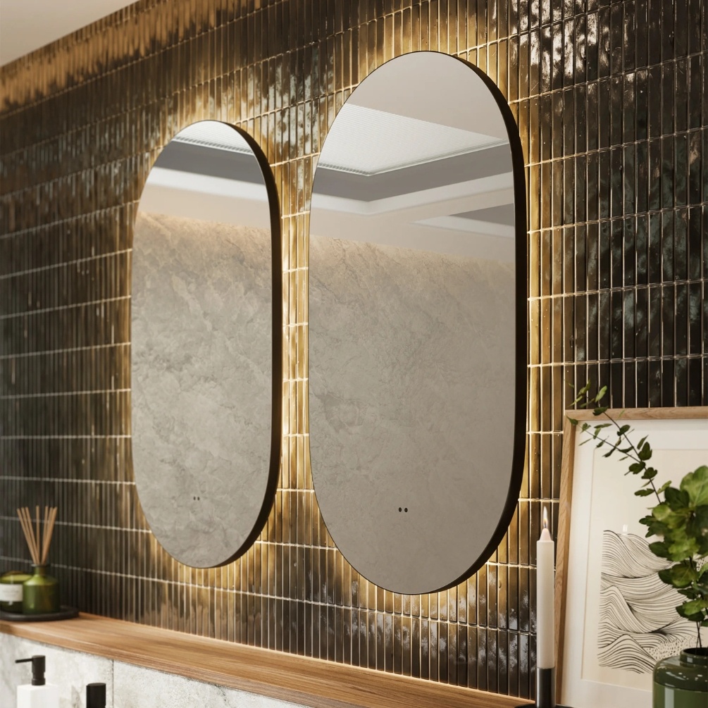 Lifestyle image of two hib. Arcane Pill 500mm x 900mm Black Illuminated Frame Mirrors side by side