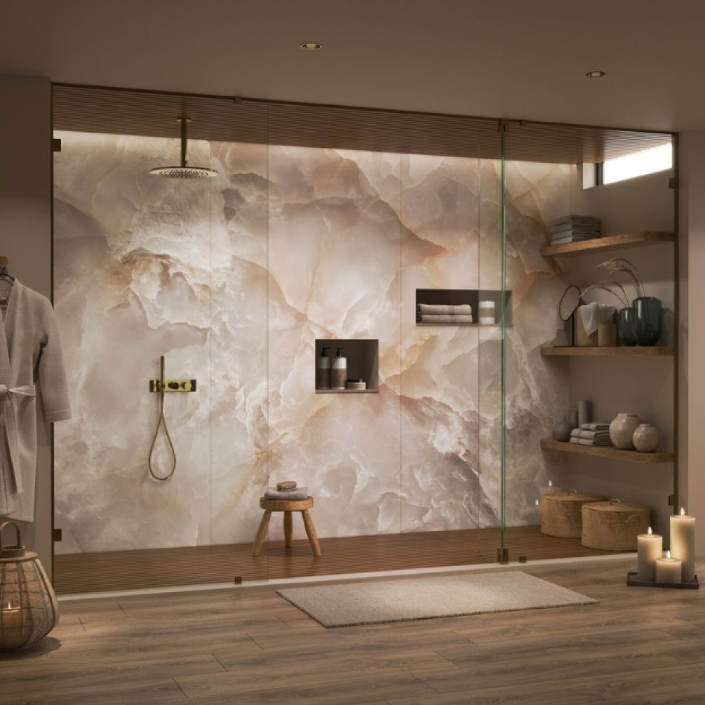 Lifestyle image of the Showerwall Acrylic Onyx Sand 2400mm x 896mm Wall Panel - SCA70 installed on a large bathroom wall with walk-in shower enclosure
