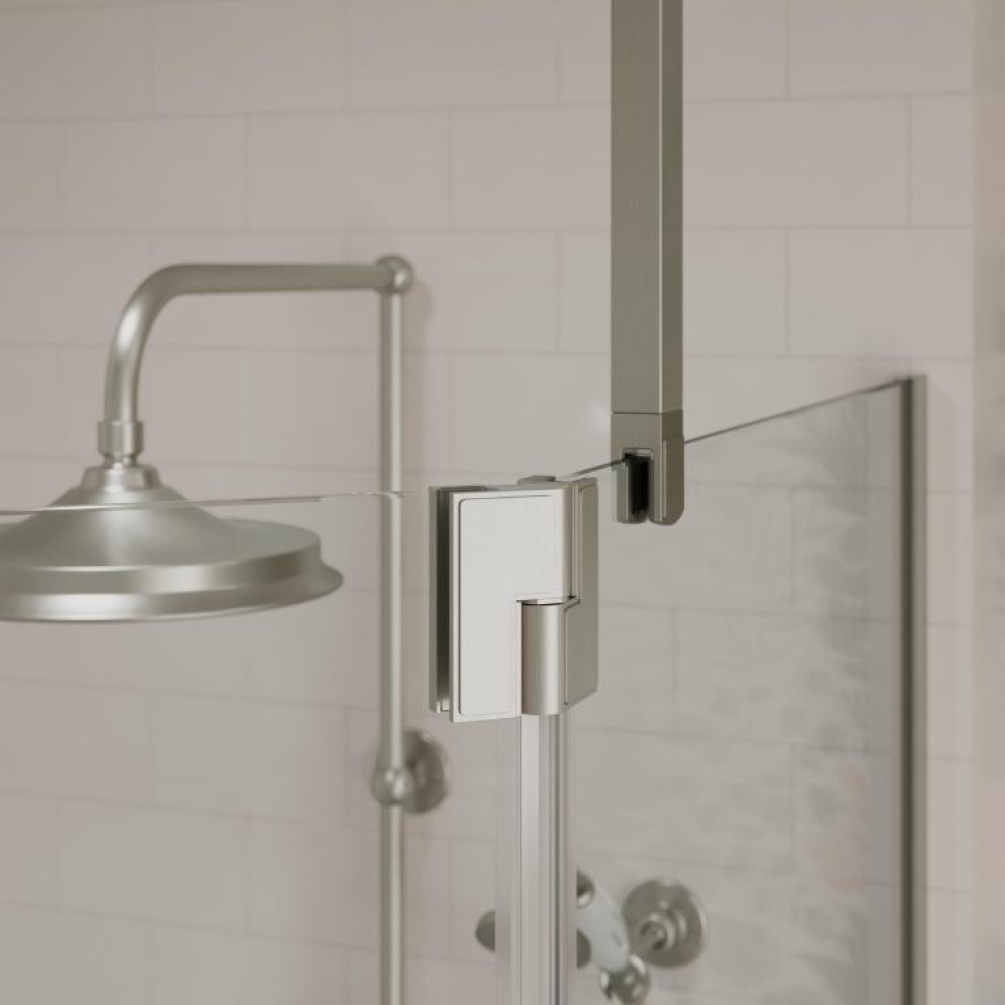 Close up product lifestyle image of the Burlington Brushed Nickel Glass to Ceiling Bracing Bar supporting a single pane of glass