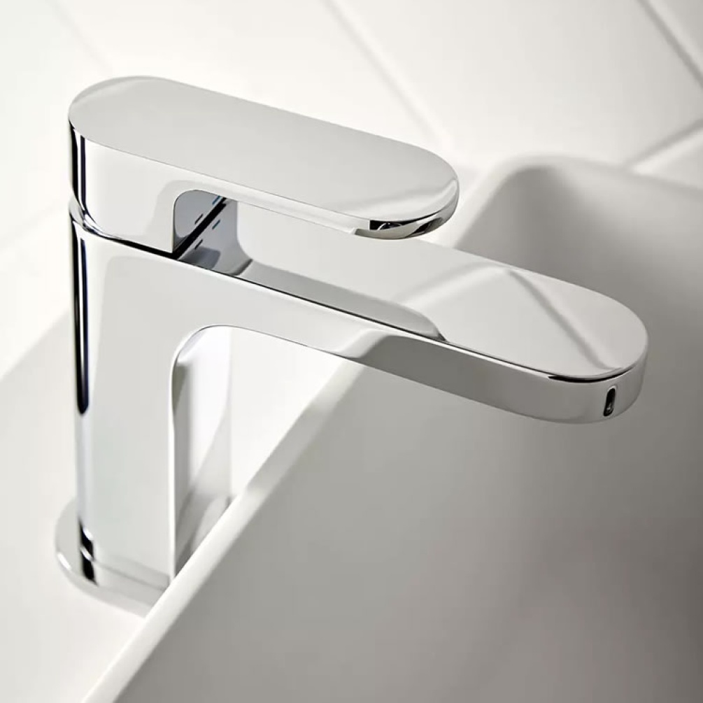 Lifestyle image of Shop for the Vado Life Slimline Mono Basin Mixer & Universal Waste today. Curved, modern mixer tap with chrome finish & waste included. 15-year guarantee.