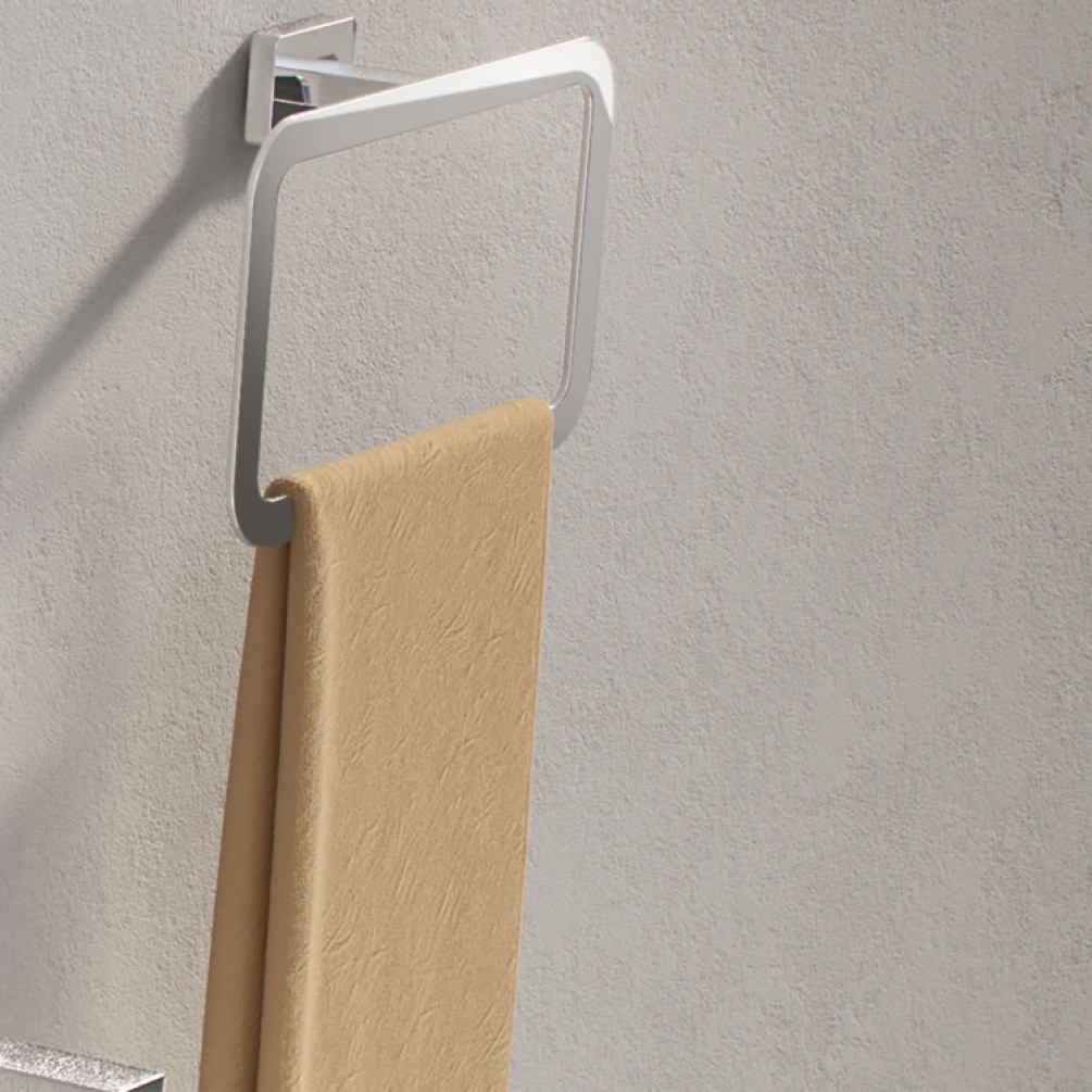 Lifestyle image of Origins Living Gedy Atena Towel Ring with orange towl.