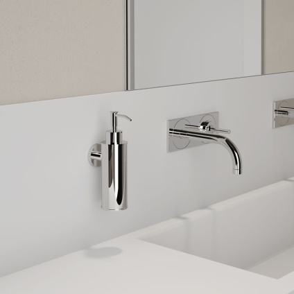 Lifestyle image of Origins Living Gedy Seal Round Soap Dispenser chrome mounted in white bathroom.