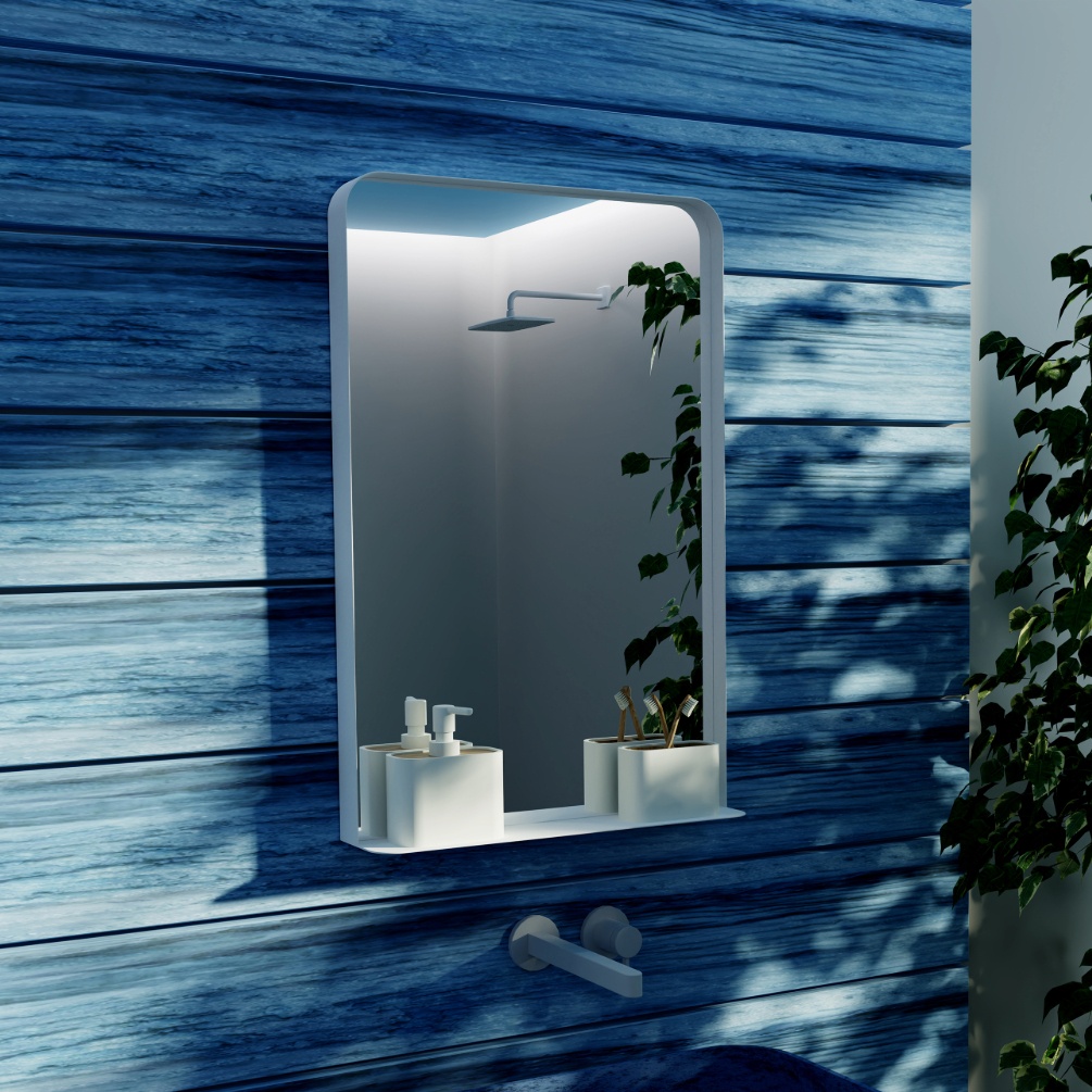 Lifestyle image of the Origins Living City Shelf 500mm x 750mm White Mirror mounted on a blue wall in front of a basin CTY-002057-WH