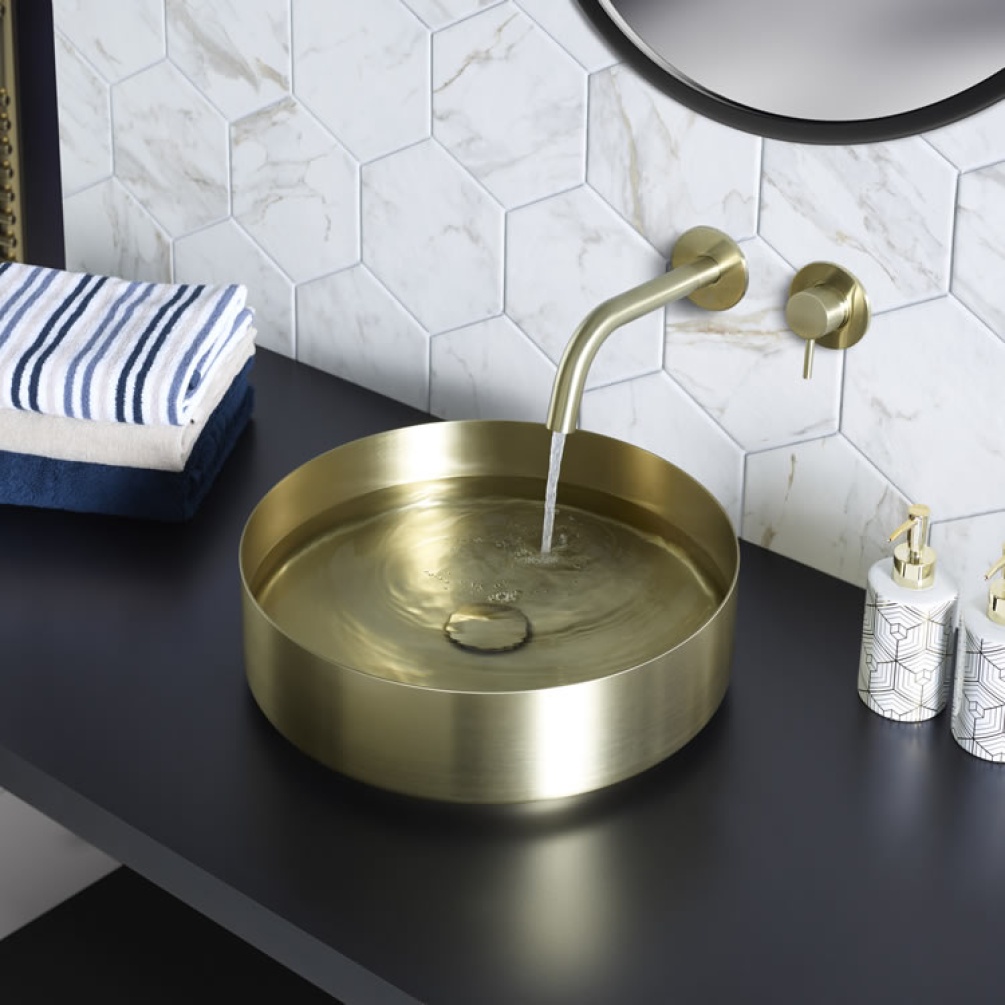 Product Lifestyle image of the JTP Vos Brushed Brass Stainless Steel Round Countertop Basin