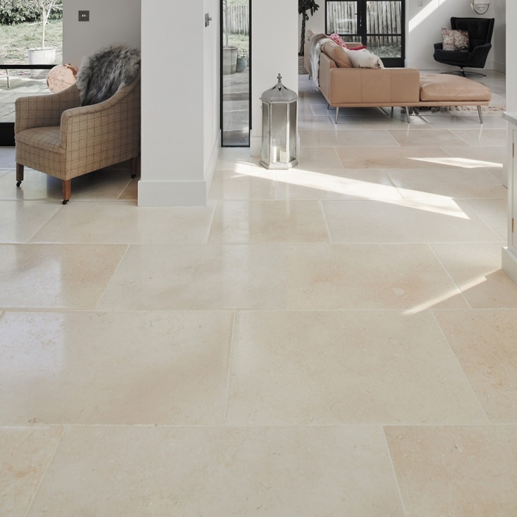Product Lifestyle Image of Ca' Pietra Bergamo Limestone Distressed Floor Tiles in living room - wide shot of all tiles CP0009