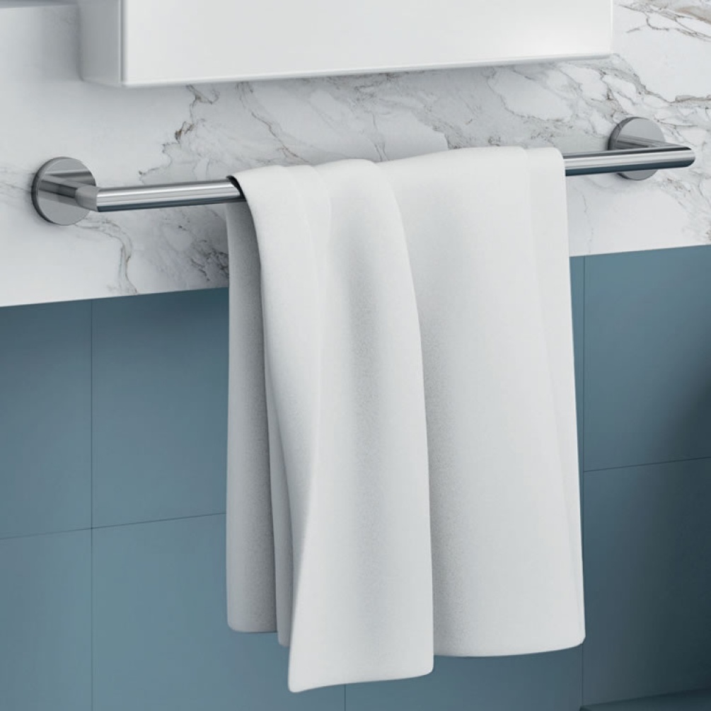 Lifestyle image of Origins Living Gedy G Pro Towel Rail chrome mounted on white marble counter.