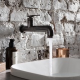 Photo Of Crosswater Union Brushed Black Chrome Wall Mounted Basin Mixer - Lifestyle