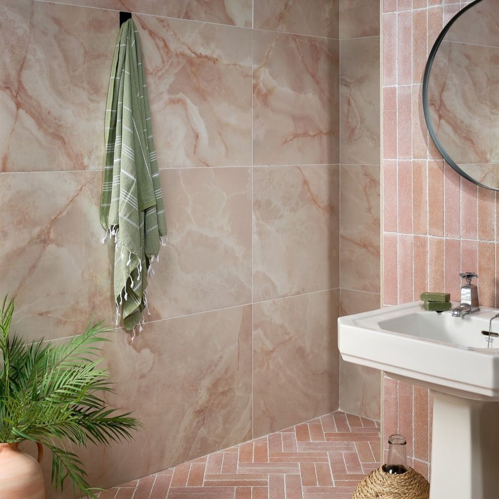 Lifestyle image of Ca Pietra California Porcelain Rose wall & floor tiles (wall) with Reform Salmon Pink