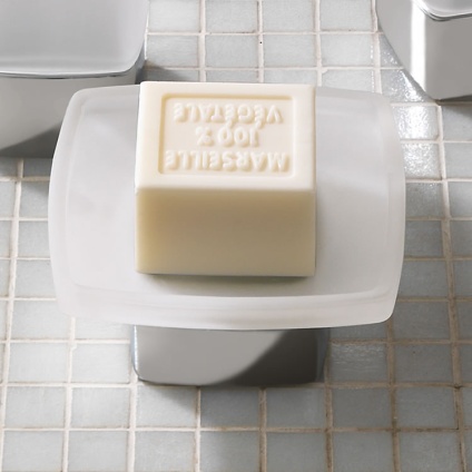 Lifestyle image of Origins Living Gedy Lounge Freestanding Soap Dish Chrome on white tiled surface.
