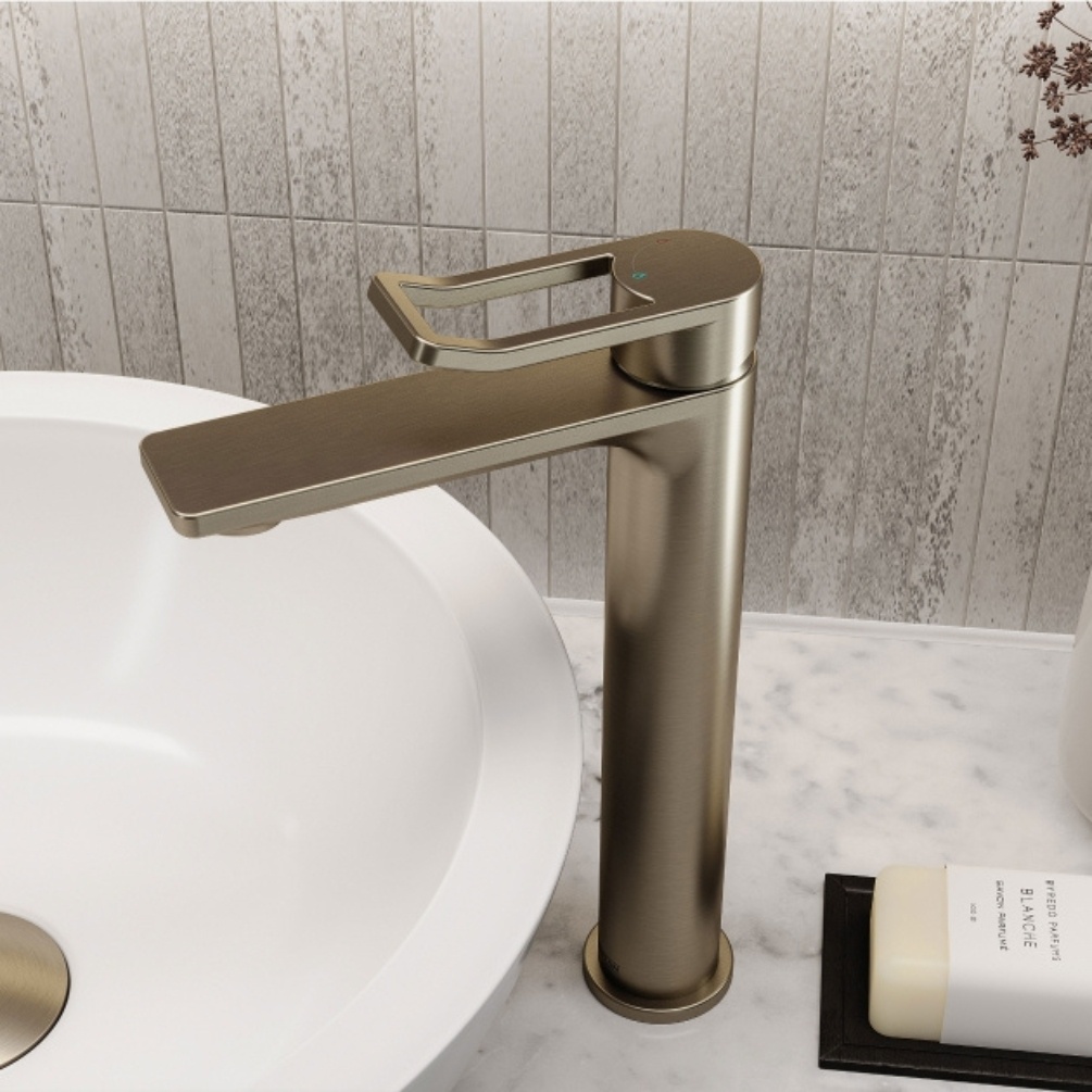 Lifestyle image of the Bristan Saffron Brushed Brass Tall Basin Mixer Tap & Click-Clack Waste