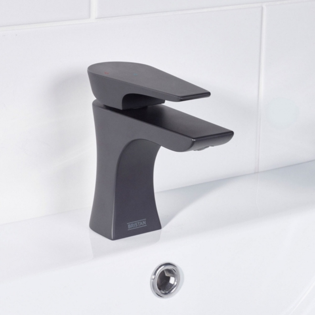Close up lifestyle image of the Bristan Hourglass Black Basin Mixer Tap & Click-Clack Waste