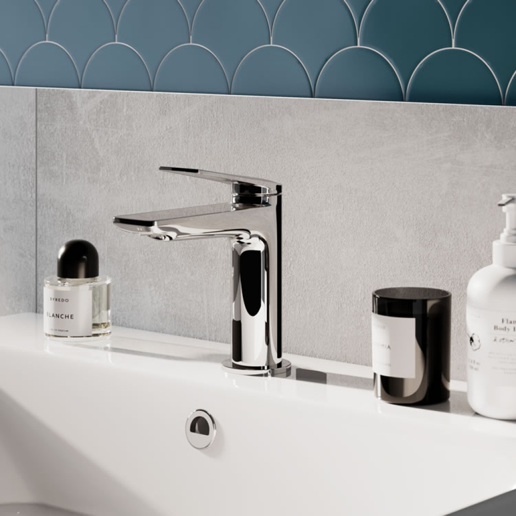 Britton Bathrooms Greenwich Basin Mixer in Chrome with light blue tiled wall