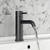 Close up product lifestyle image of the JTP Vos Matt Black Basin Mixer with Designer Knurled Handle